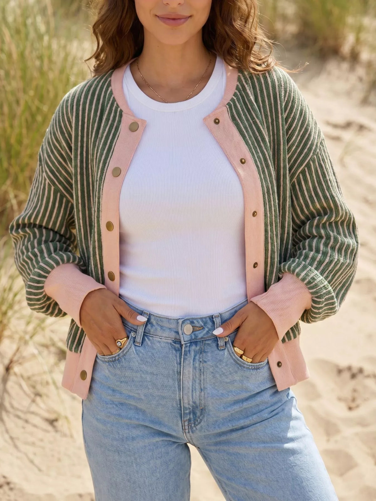 Green and pink striped striped round neck patchwork cardigan — front view