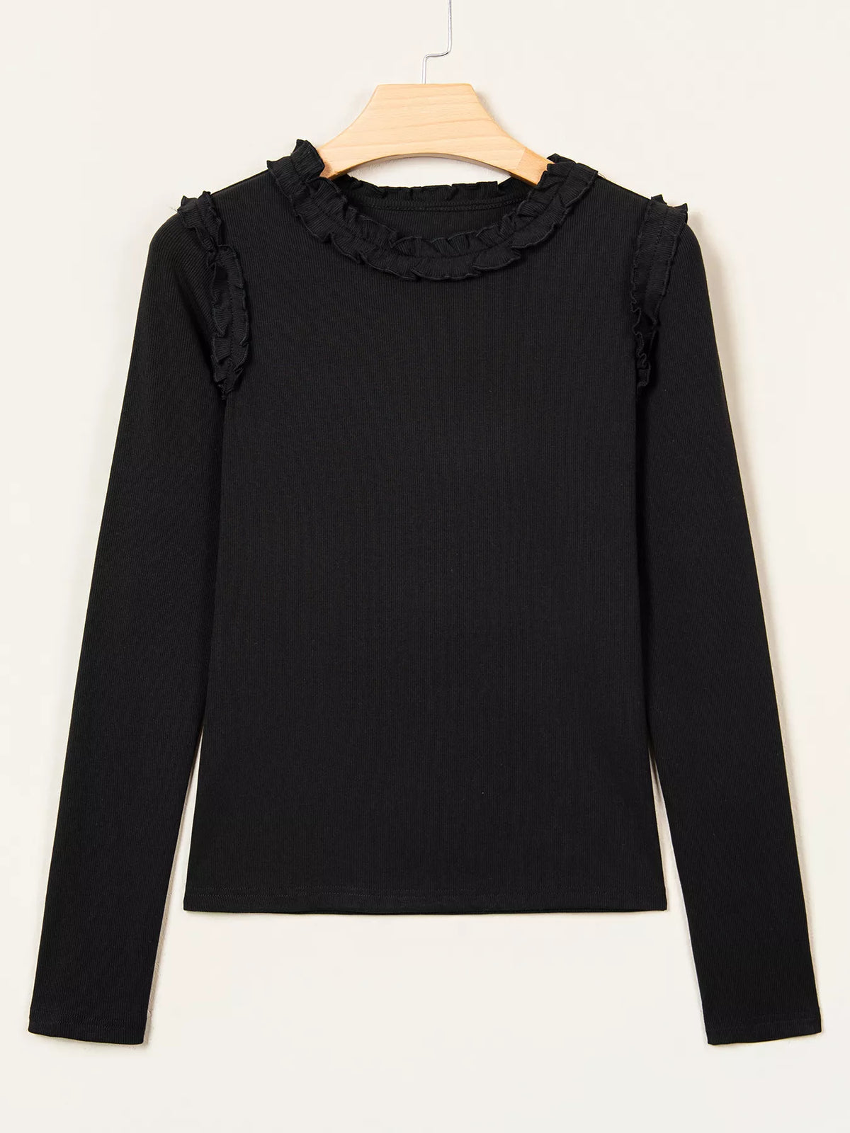 Black round neck frill detail long sleeve top — front view