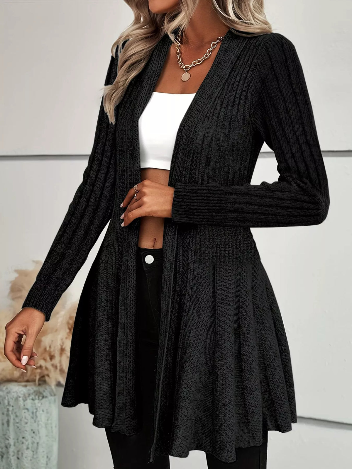 Black ribbed knit open front flared cardigan