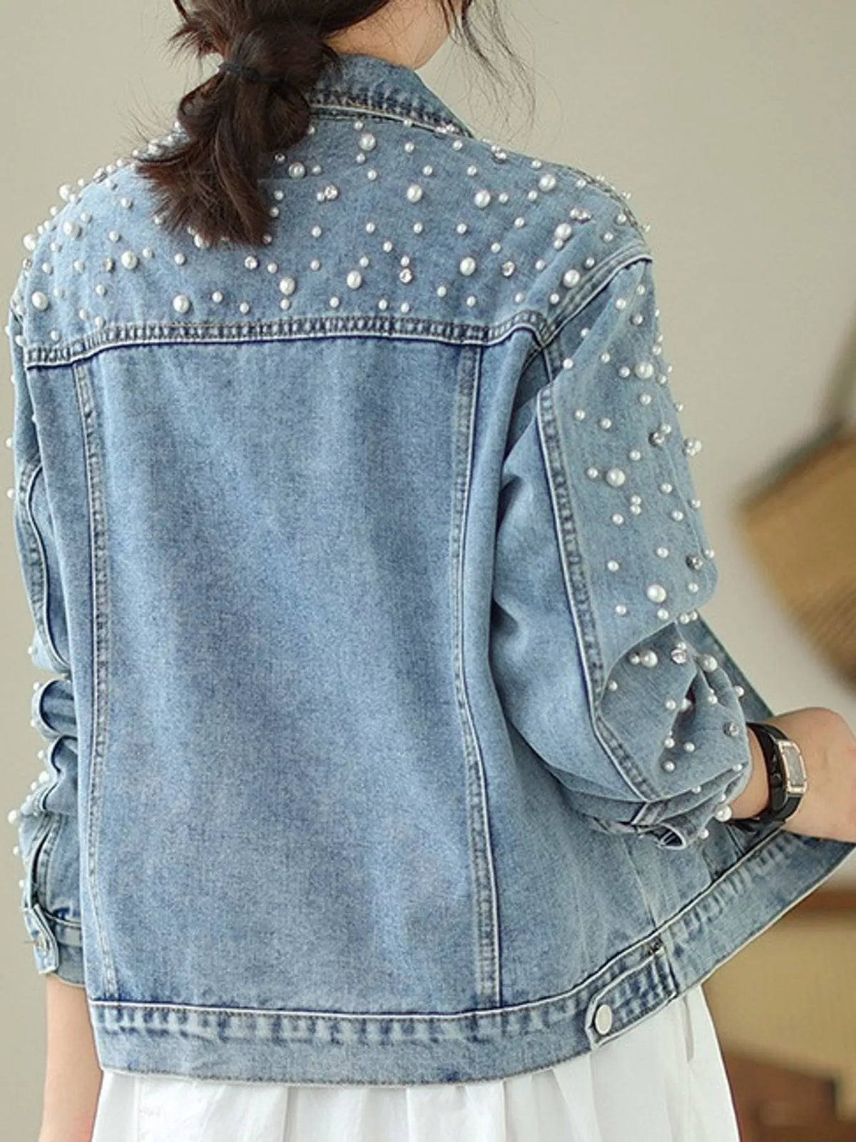 Women's Pearl Detail Button Up Denim Jacket in blue — back view