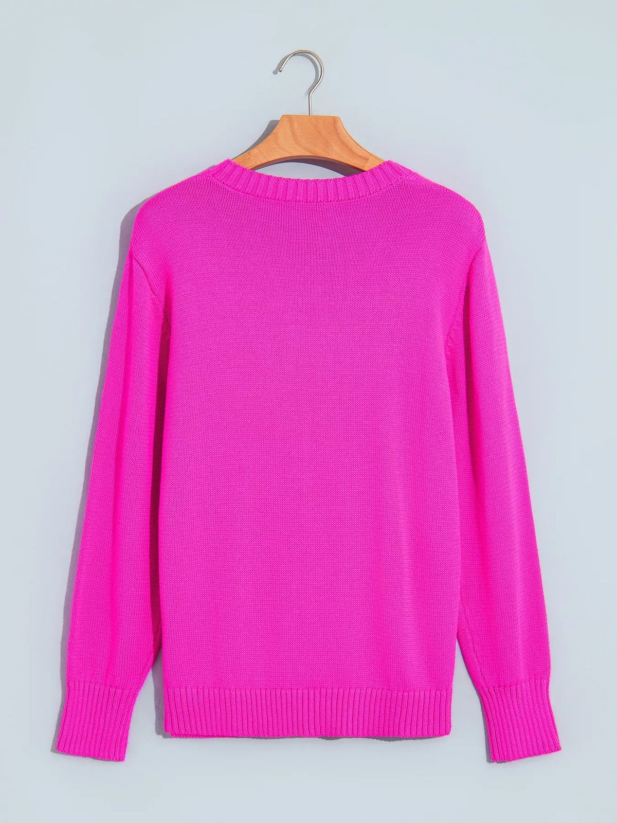 Merry sweater, pink hanging back