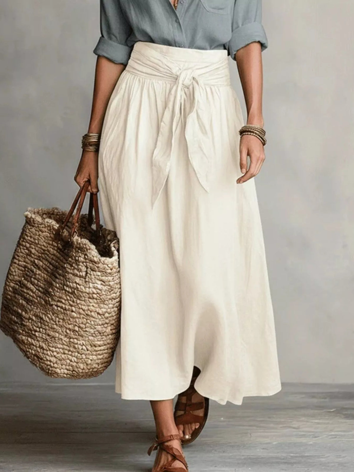 Blue and cream button-front shirt and skirt set, skirt and tie detail