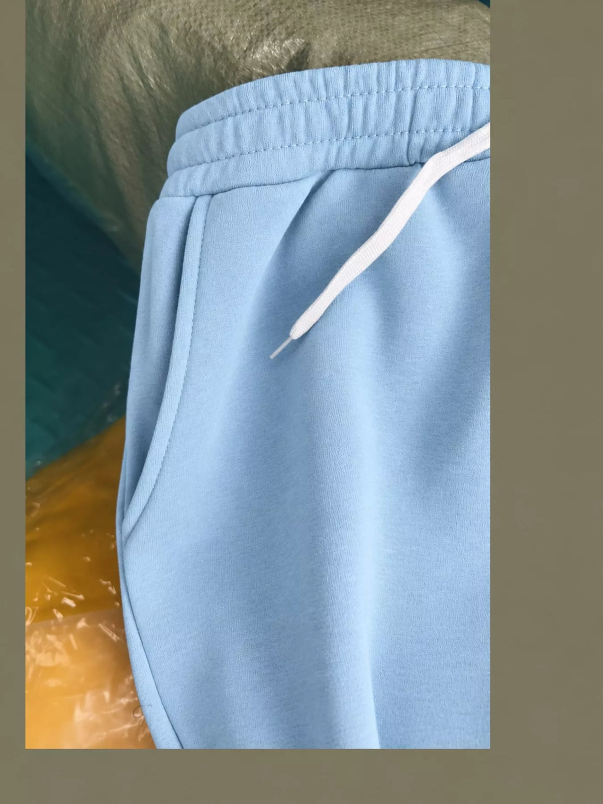 Light blue wide-leg pants with drawstring, detail view