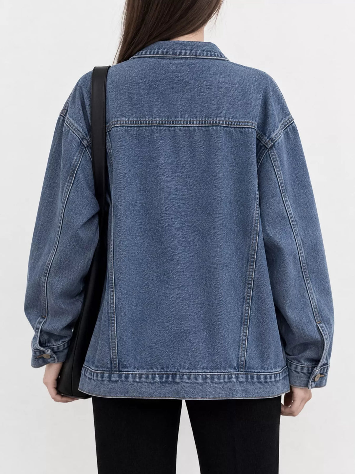 Blue washed denim utility jacket, back view