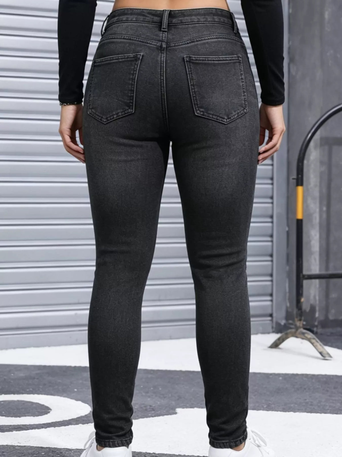 Black high-waisted fleece-lined skinny jeans