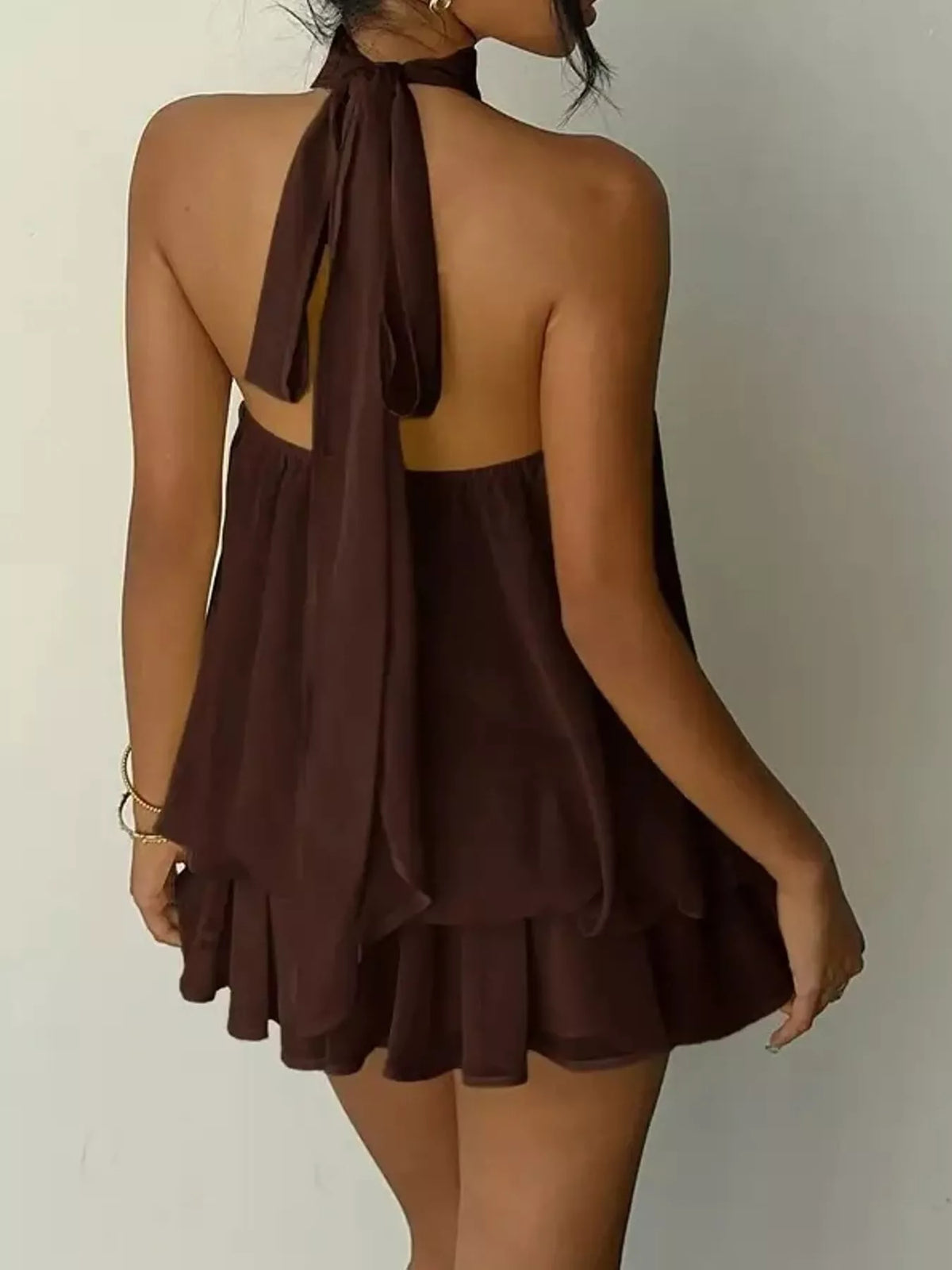 Brown halter neck layered mini dress, back tie view