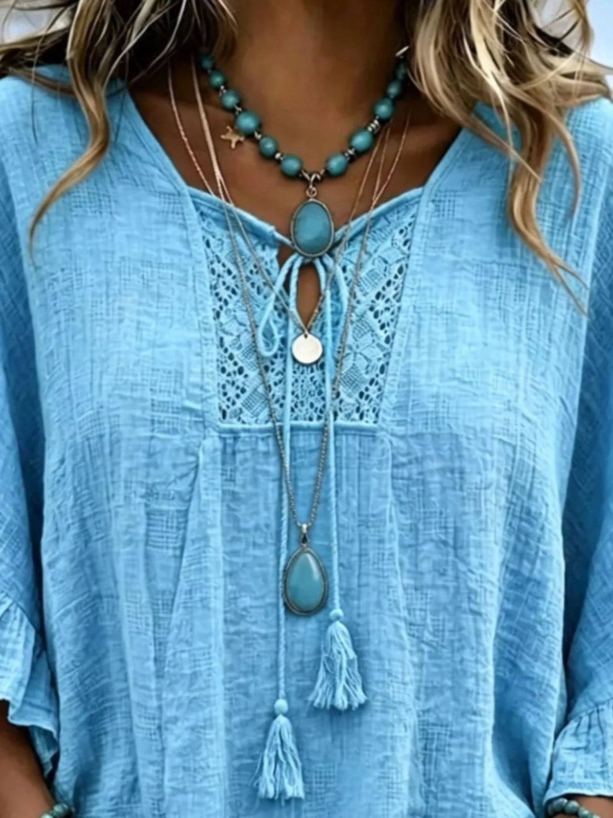 Trendsi Full Size Tassel Tie Neck Ruffled Hem Blouse Plus Size -