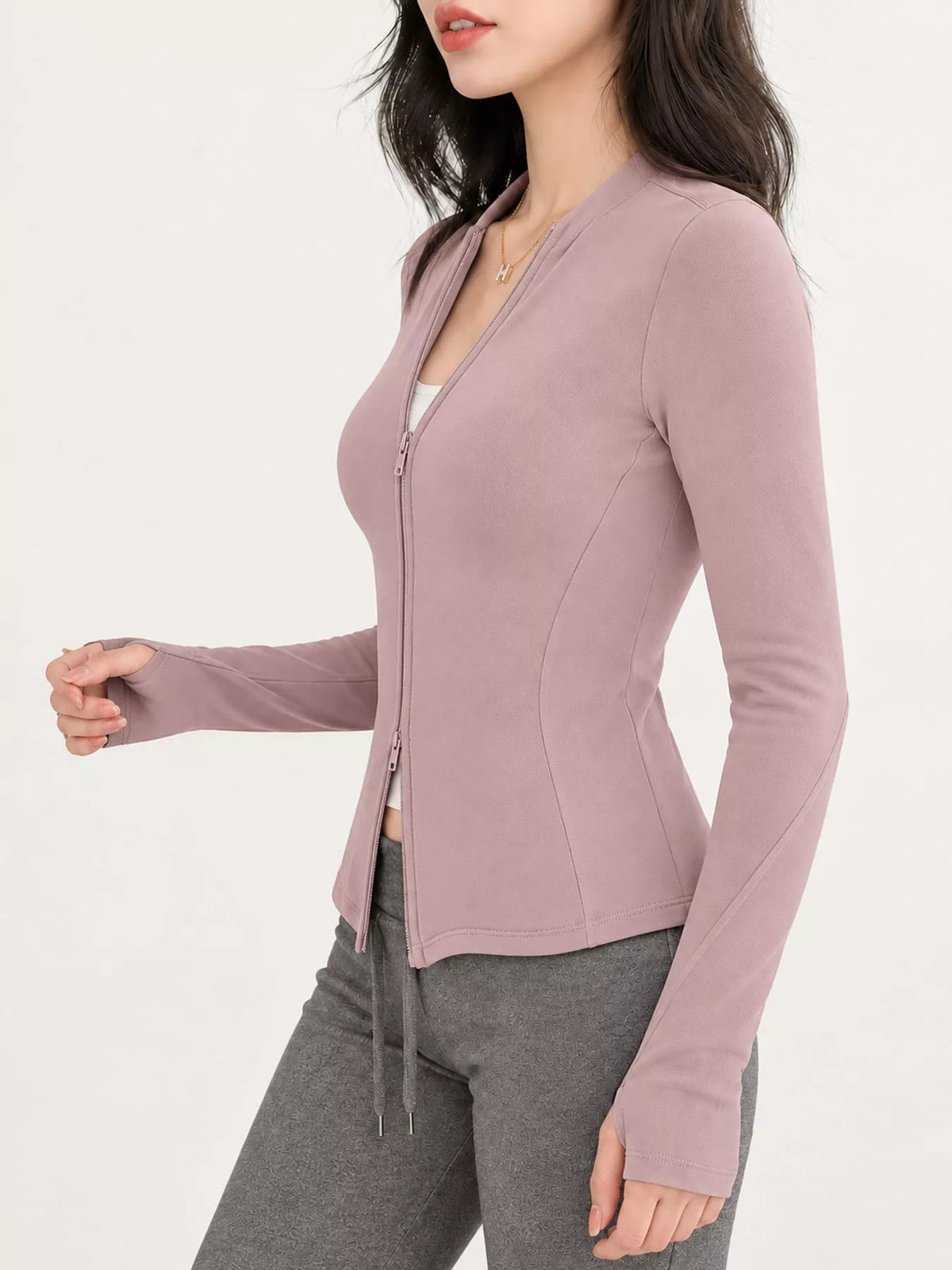 Pink slim-fit zip-up long sleeve jacket — side view