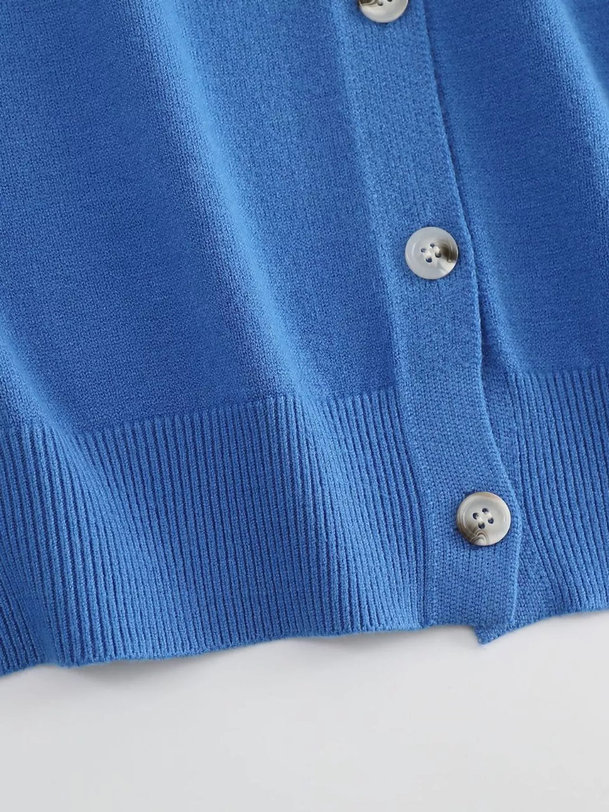 Blue crew neck button down knit cardigan, detail view