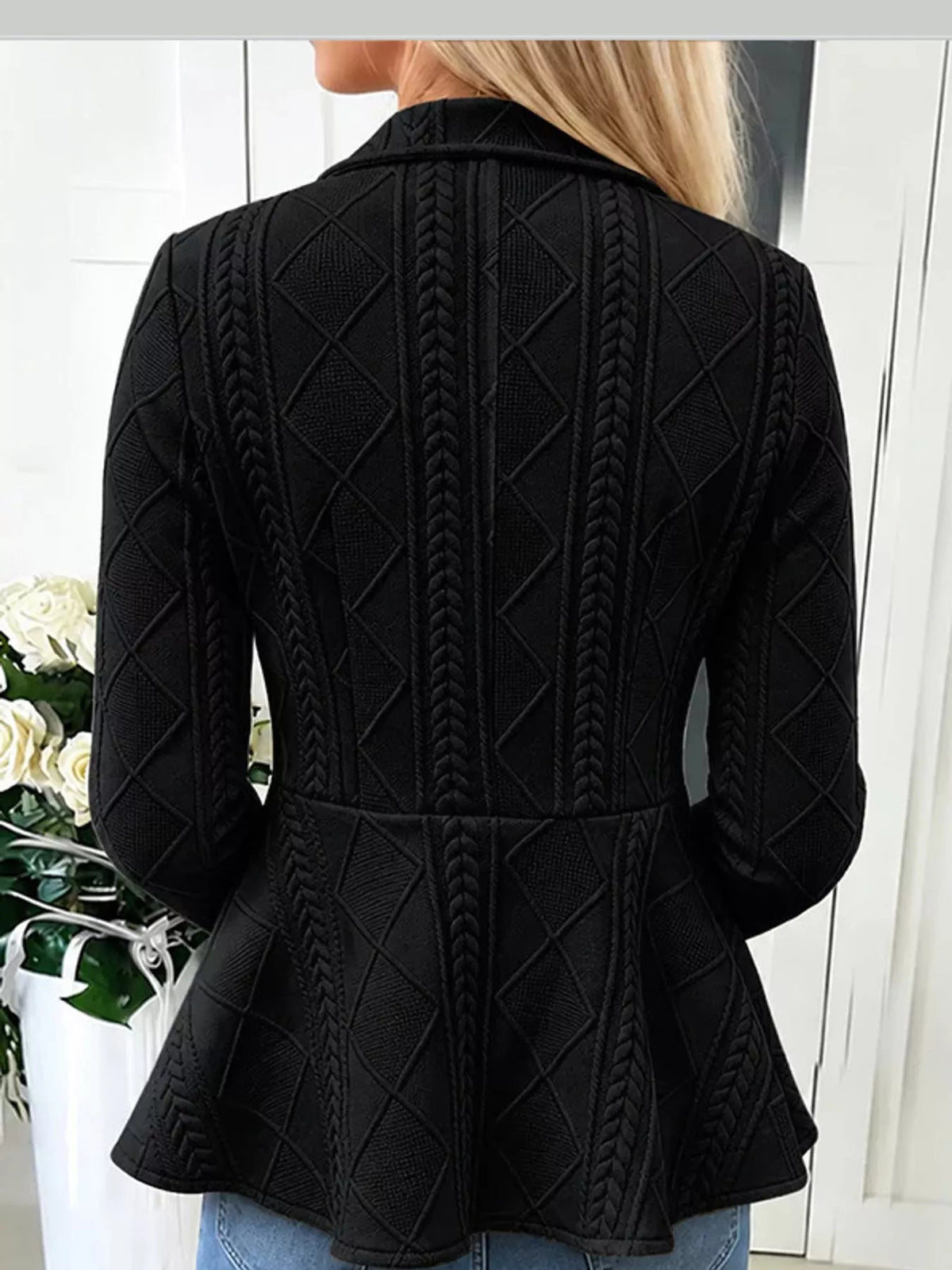 Black cable-knit button-up cardigan — back view