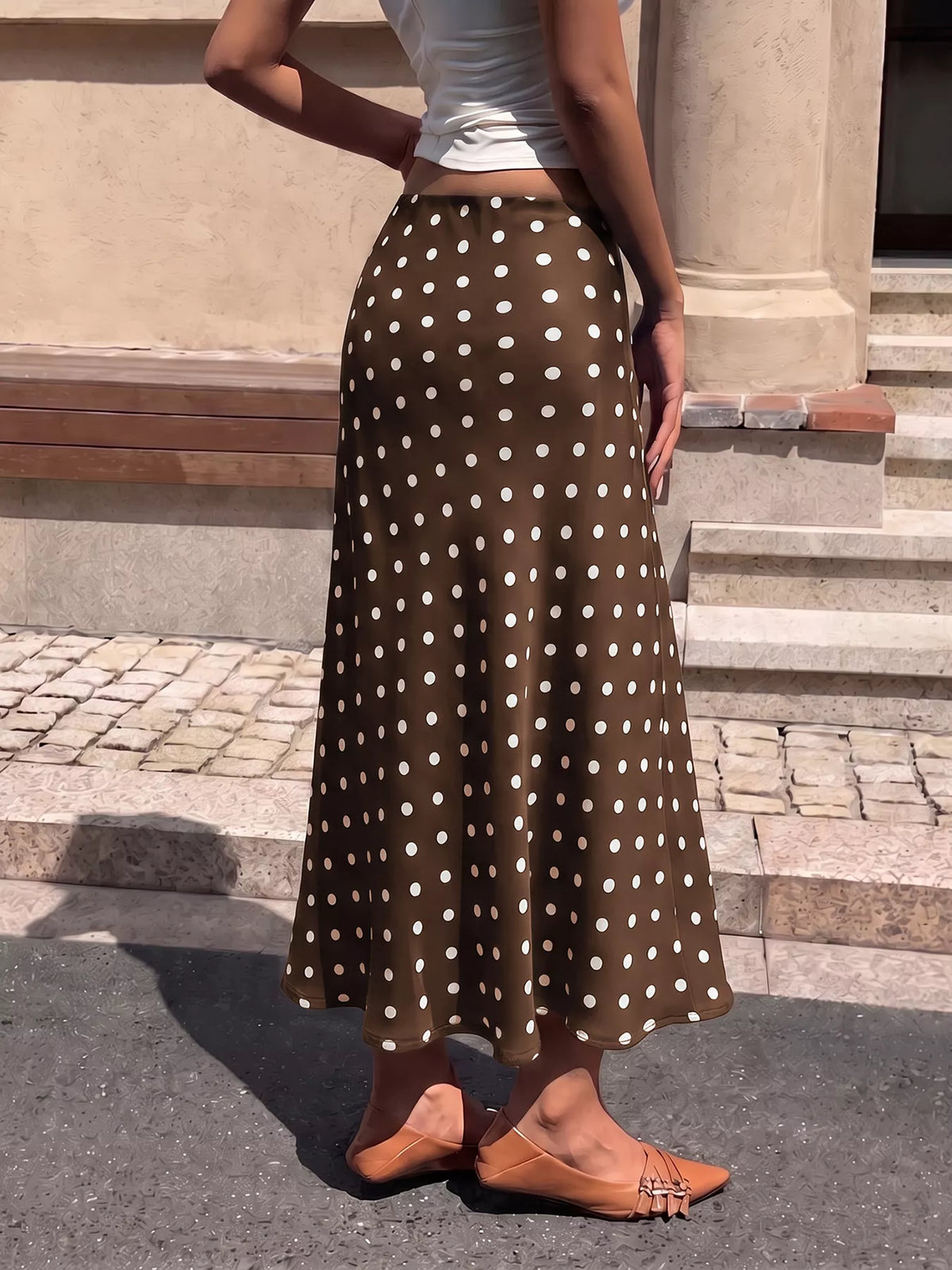 Brown and white polka dot midi skirt, back view
