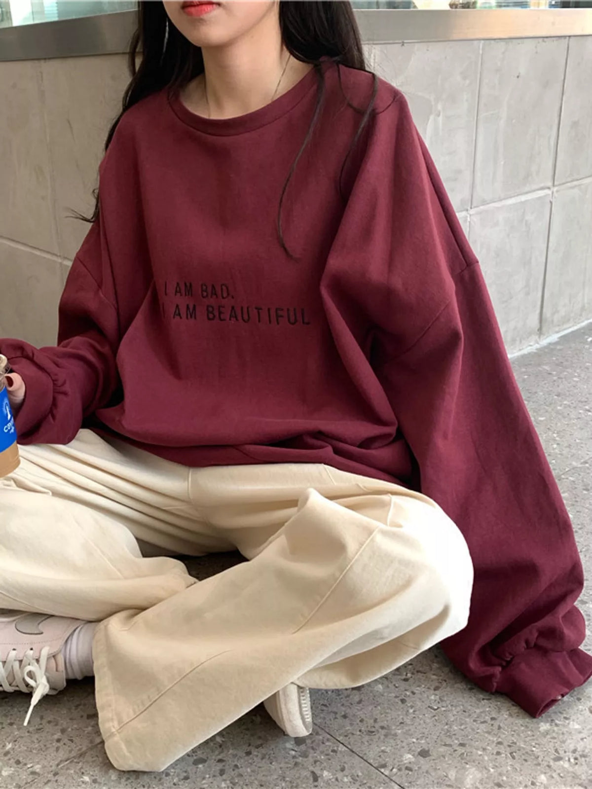 Letter-print sweatshirt, burgundy seated view