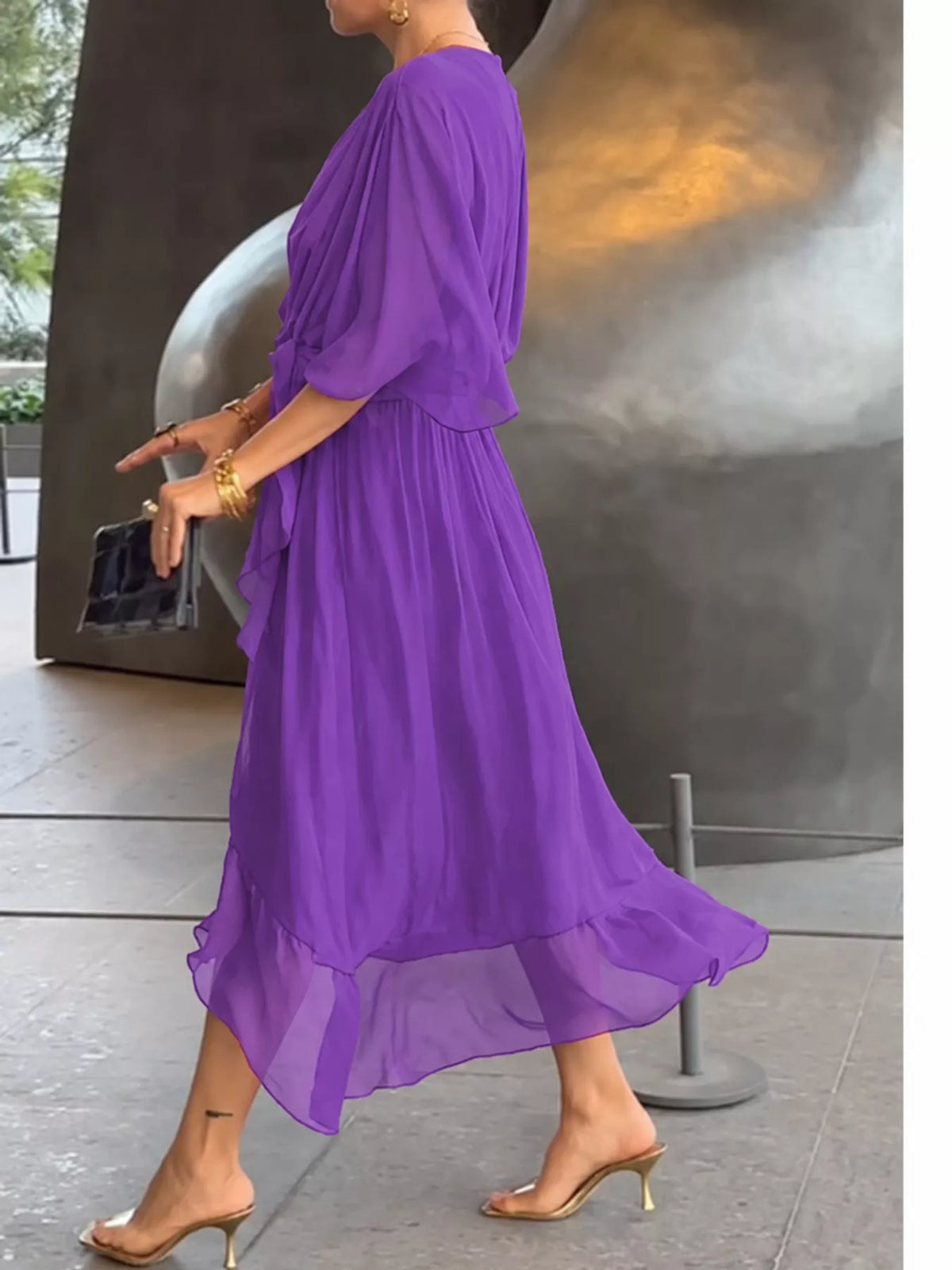 Purple batwing sleeve wrap dress with waist tie, side view