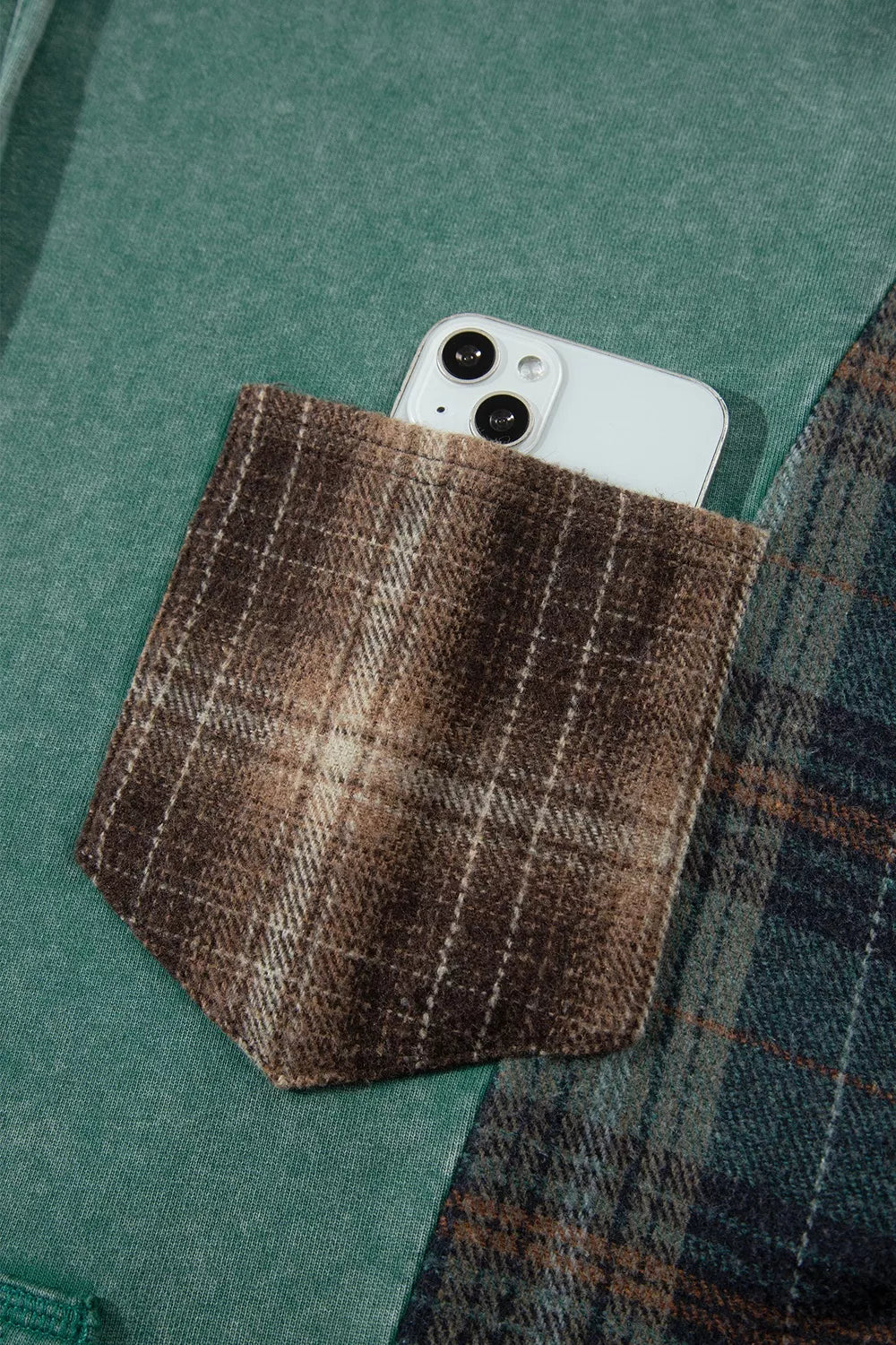 Plaid Kangaroo Pocket Hoodie in green, chest pocket detail