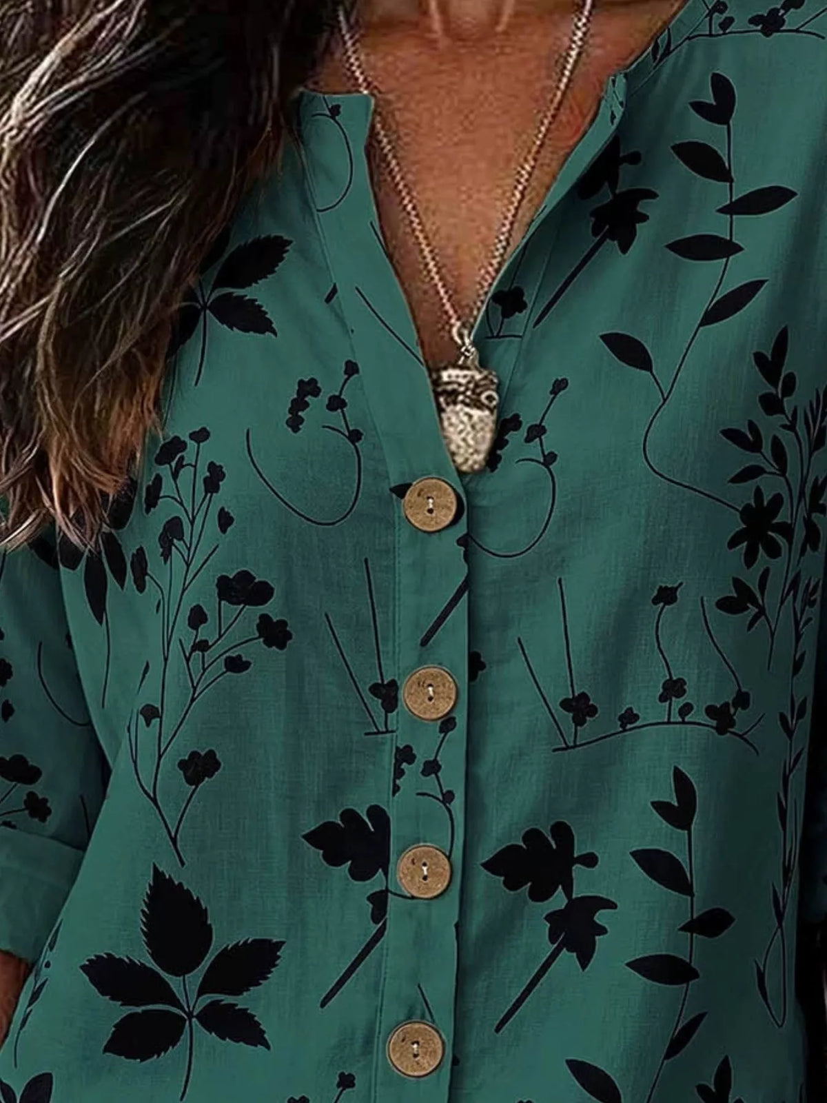 Notched-neck shirt, green black-floral neckline