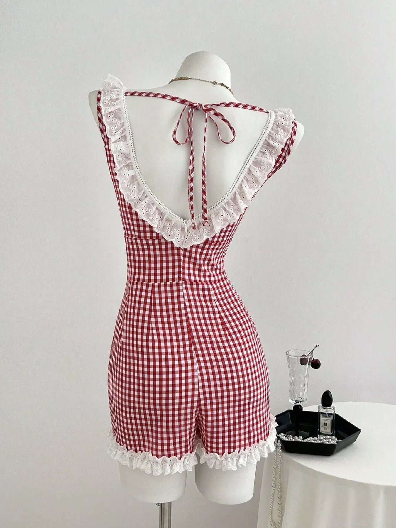 Trendsi Gingham Lace-Trimmed Romper with Bow Detail -