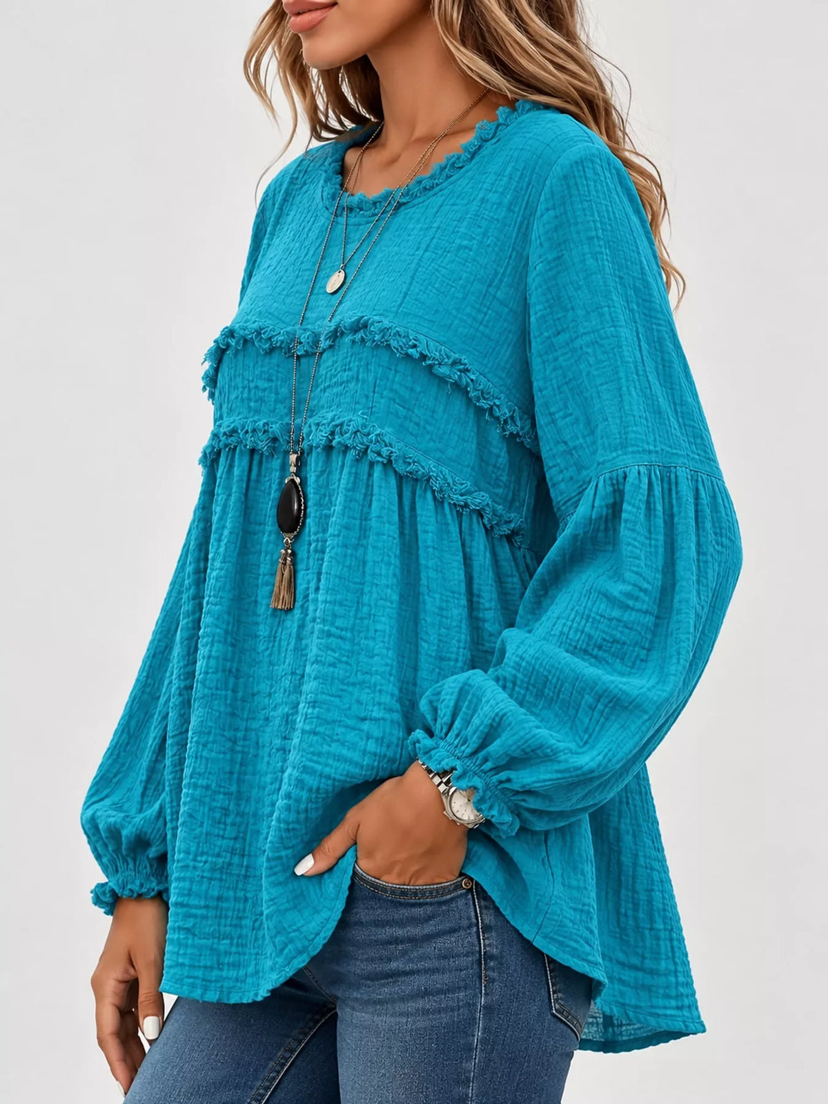 Teal textured frayed-trim peplum blouse