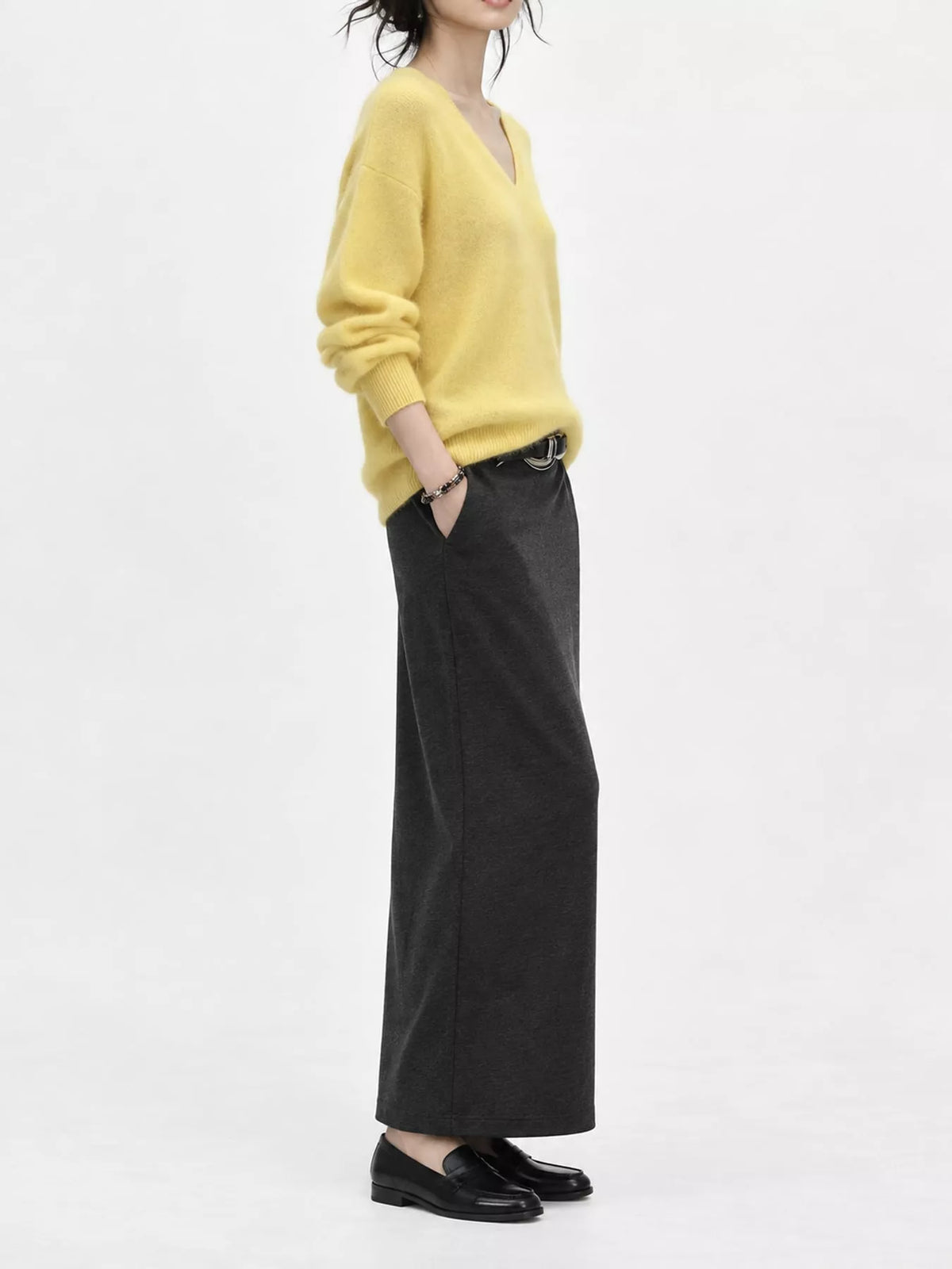 Yellow v-neck sweater, side view