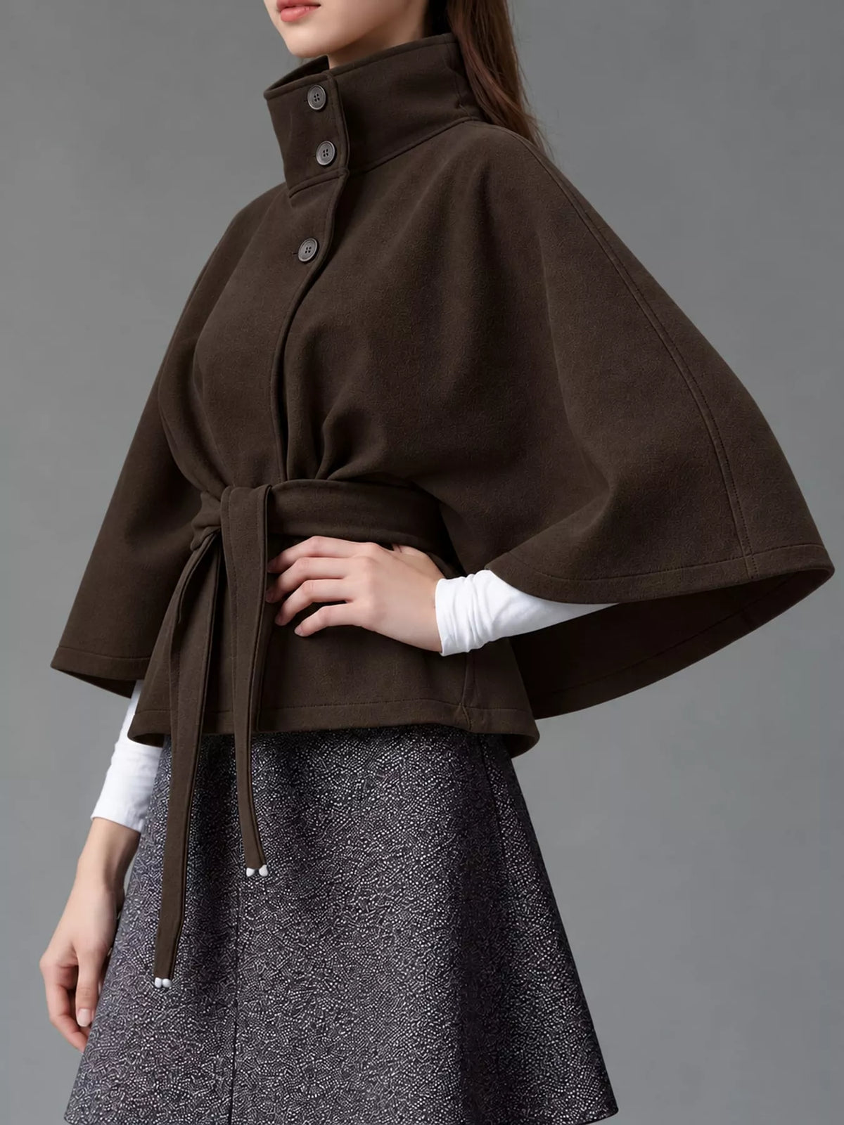 Brown belted button-front cape — side view