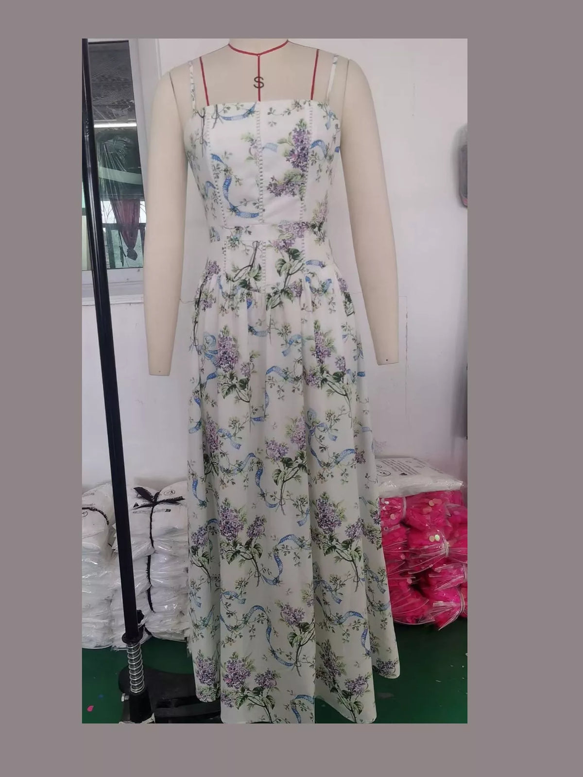 Women's Paneled Bodice Gathered Midi Dress in blue floral — mannequin front view
