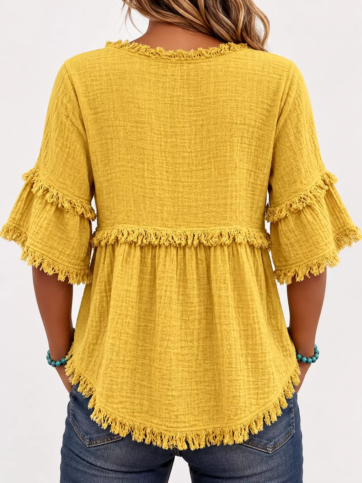 Yellow frayed edge textured blouse, back view
