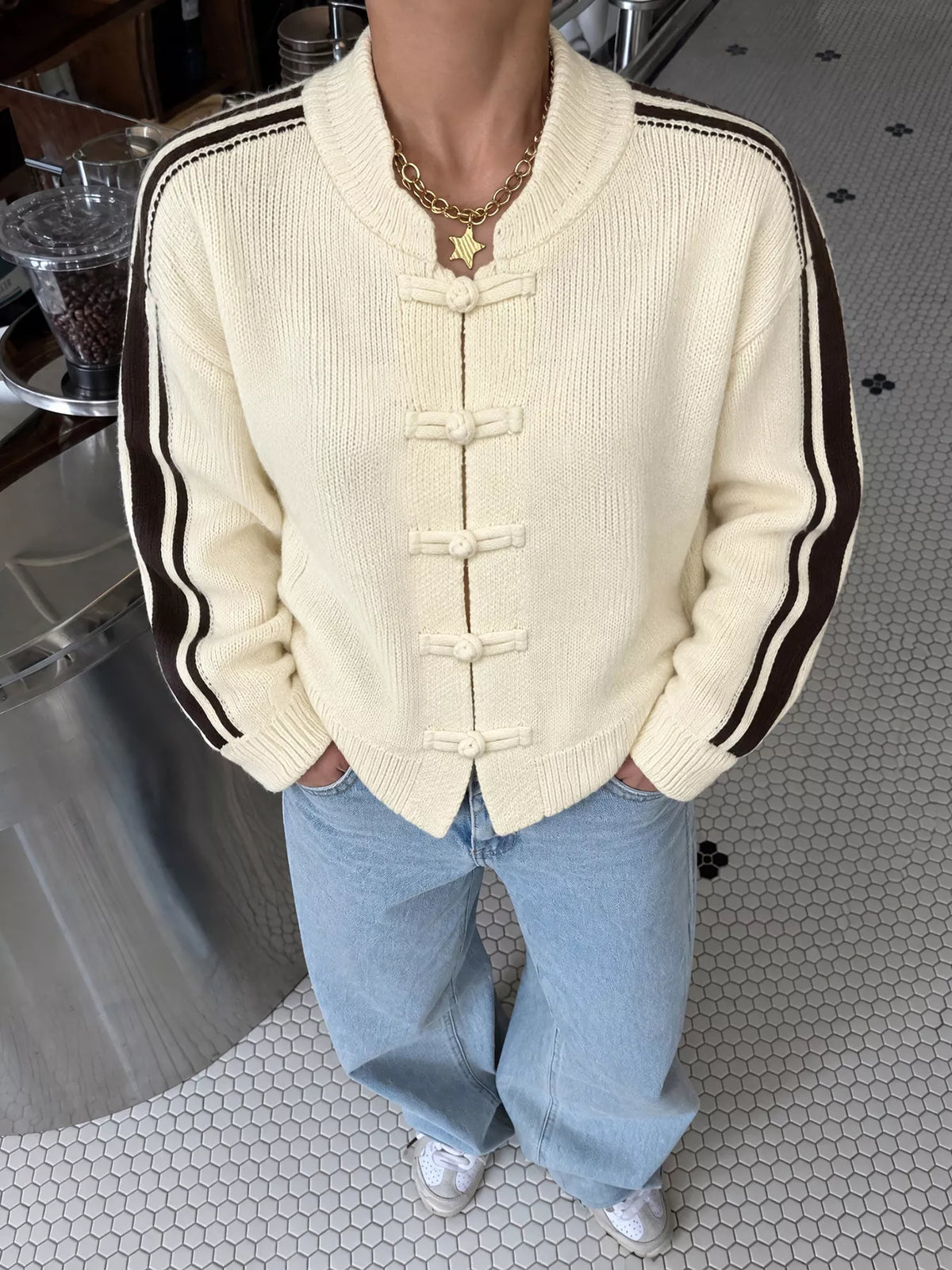 Cream Chinese knot button cardigan with sleeve stripes, front view