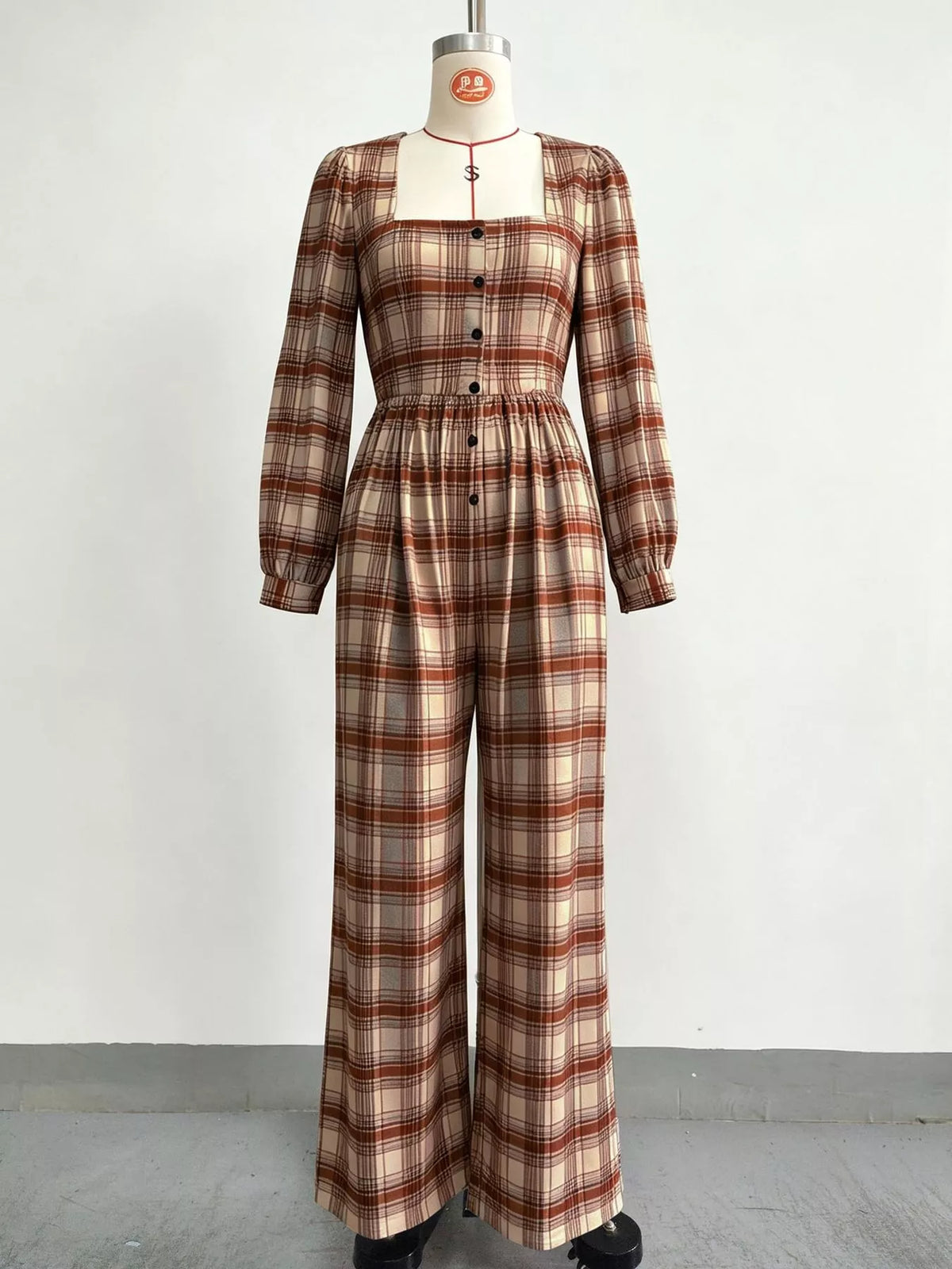 Plaid jumpsuit, brown hanging front