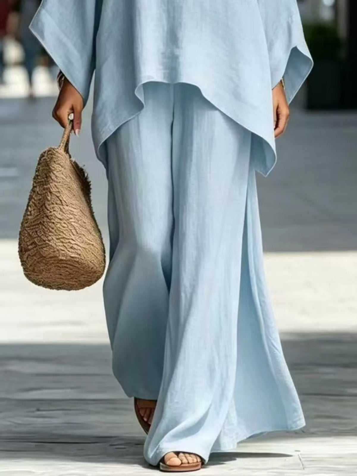 Light blue matching wide-leg pants and top hem detail