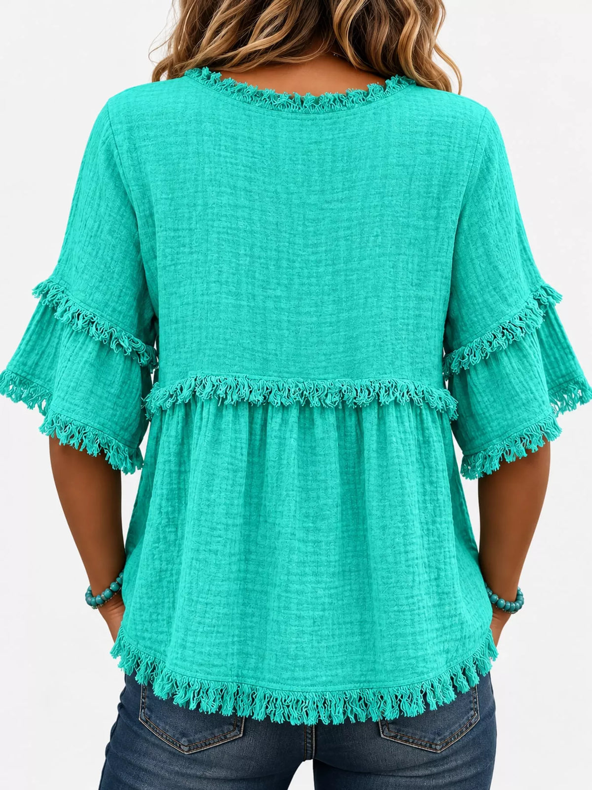 Turquoise frayed edge textured blouse, back view