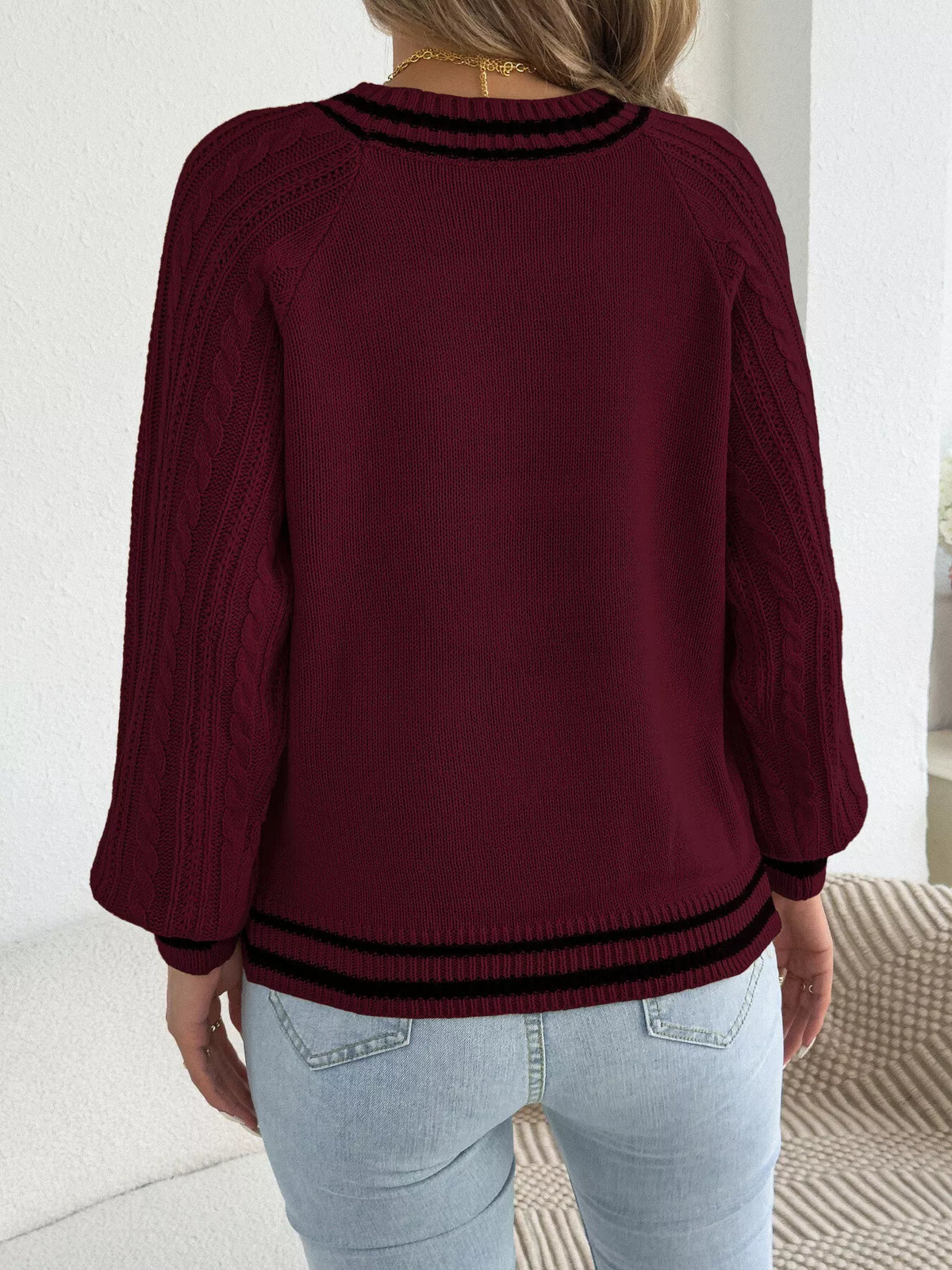 Burgundy striped trim cable knit sweater, back view