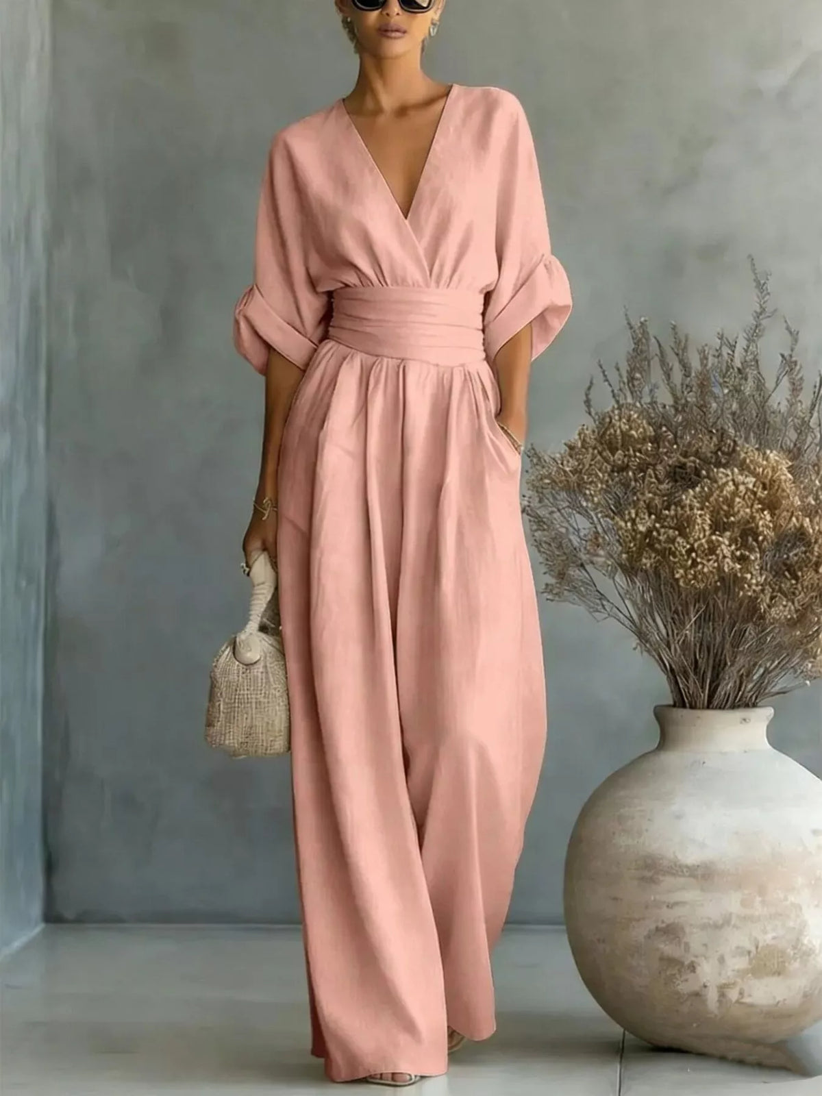 Pink V-neck wide-leg jumpsuit, front view