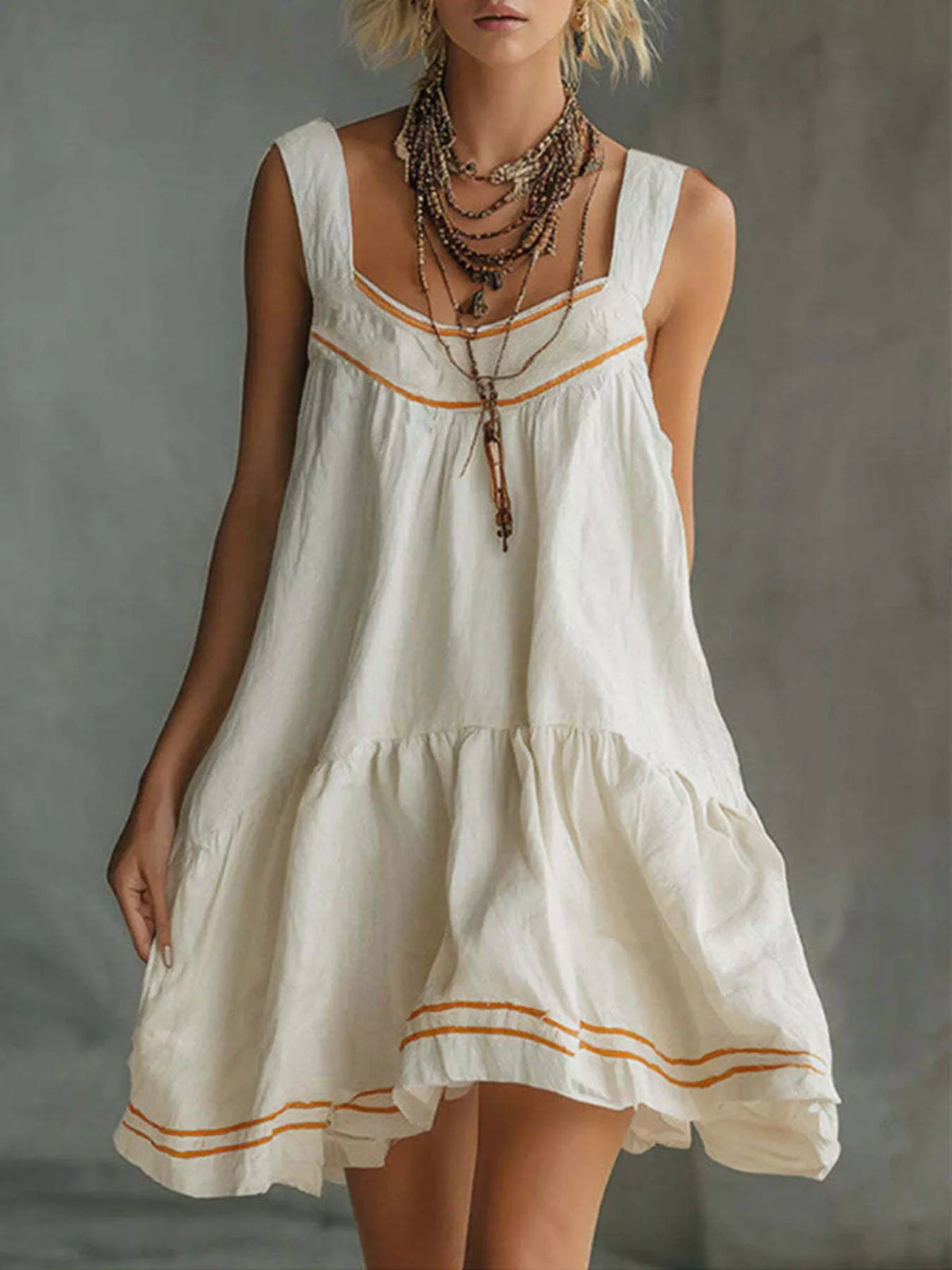 Sleeveless Tiered Mini Dress in white, front view