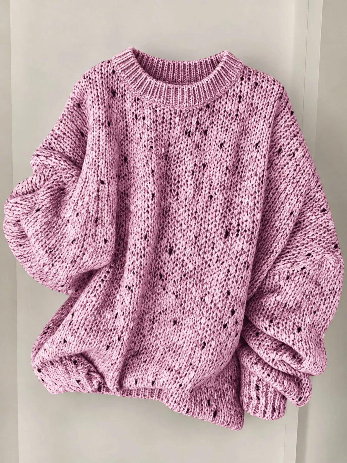 Pink chunky knit round neck sweater, front view