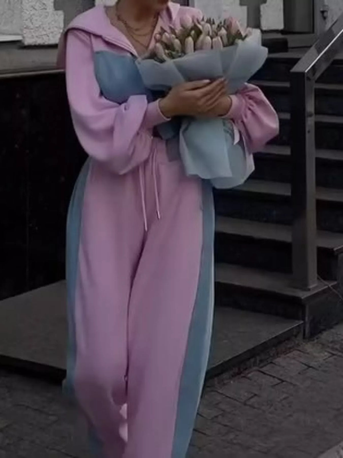 Pink and blue color-block zip-up hoodie and wide-leg pants set — front view