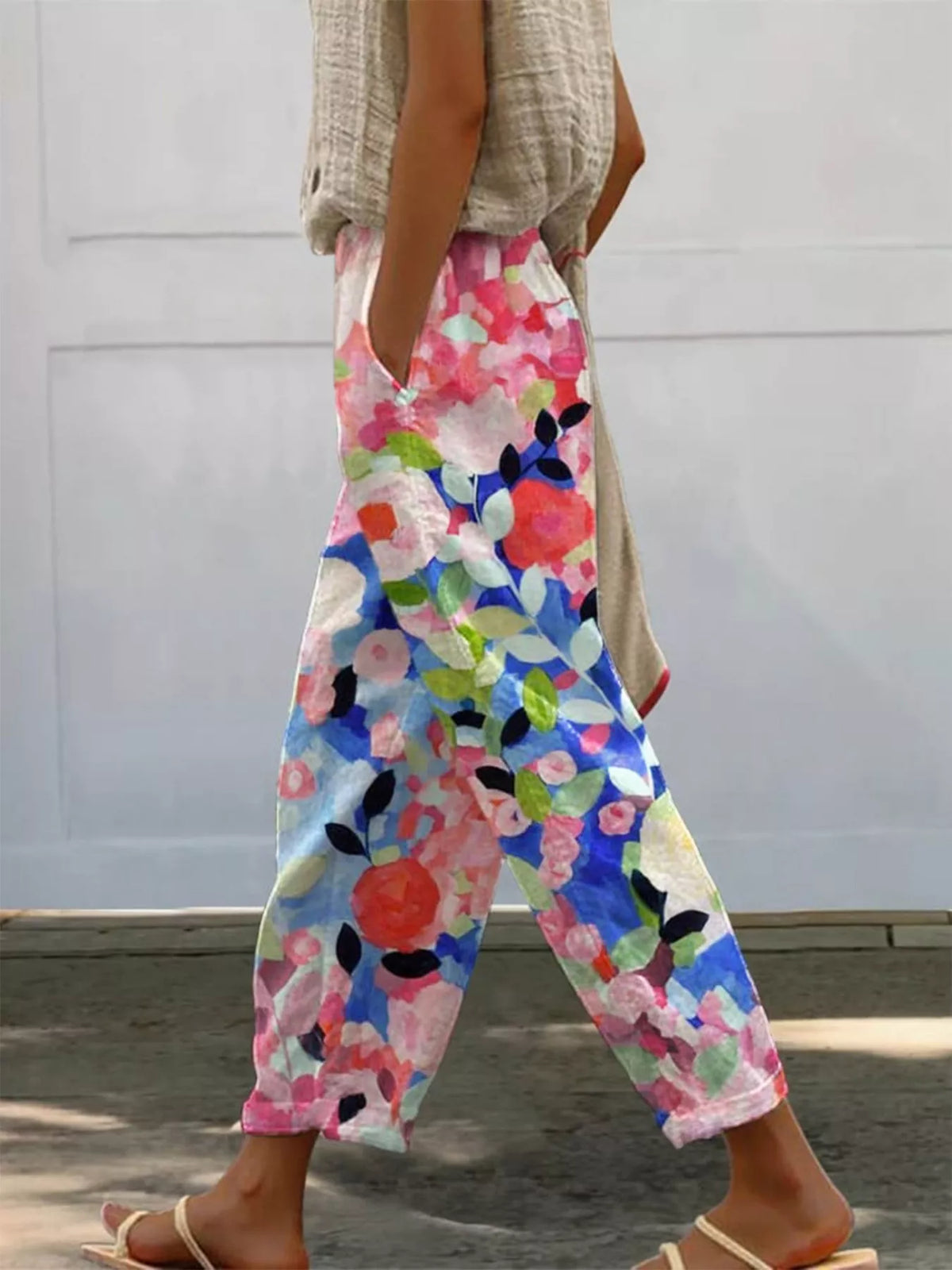 Multicolor floral tapered pants, side view, pink floral print