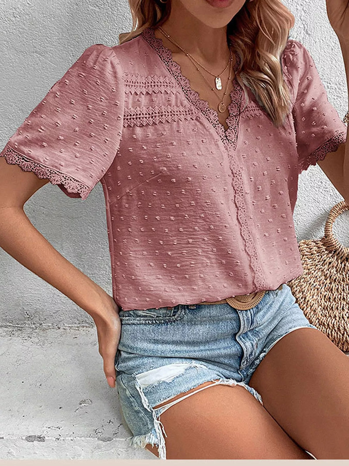 Pink swiss dot v-neck blouse with lace trim