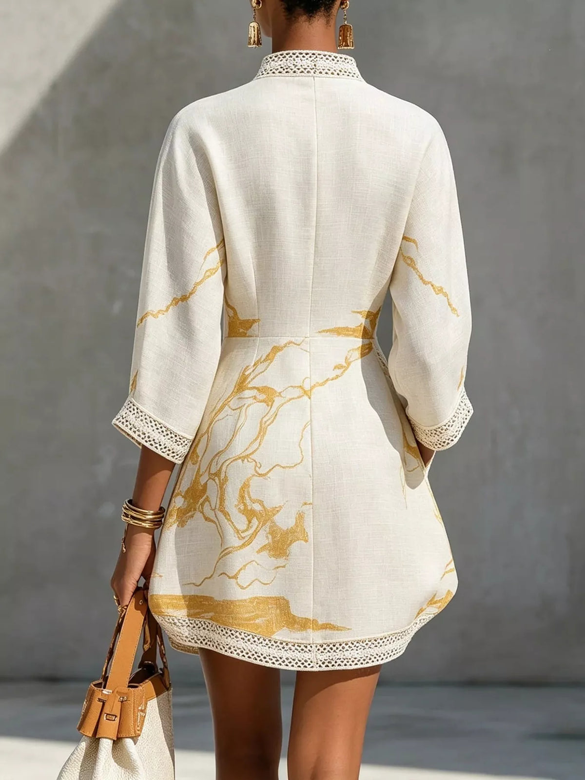 White notched 3/4 sleeve mini dress, back view