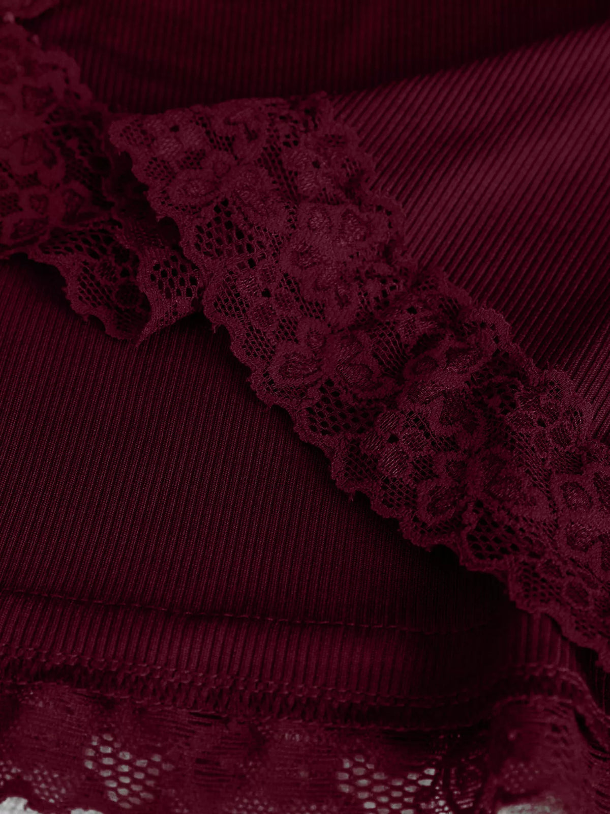 Women's Lace Trim Flare Sleeve Blouse in burgundy — hem detail view