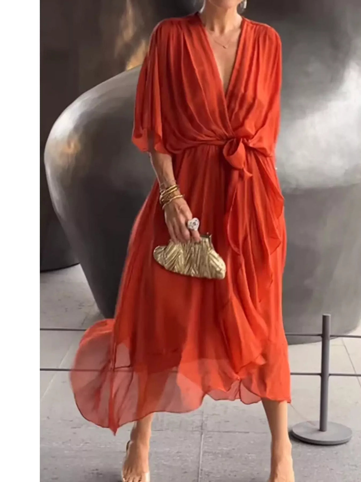 Orange-red batwing sleeve wrap dress with waist tie, front view