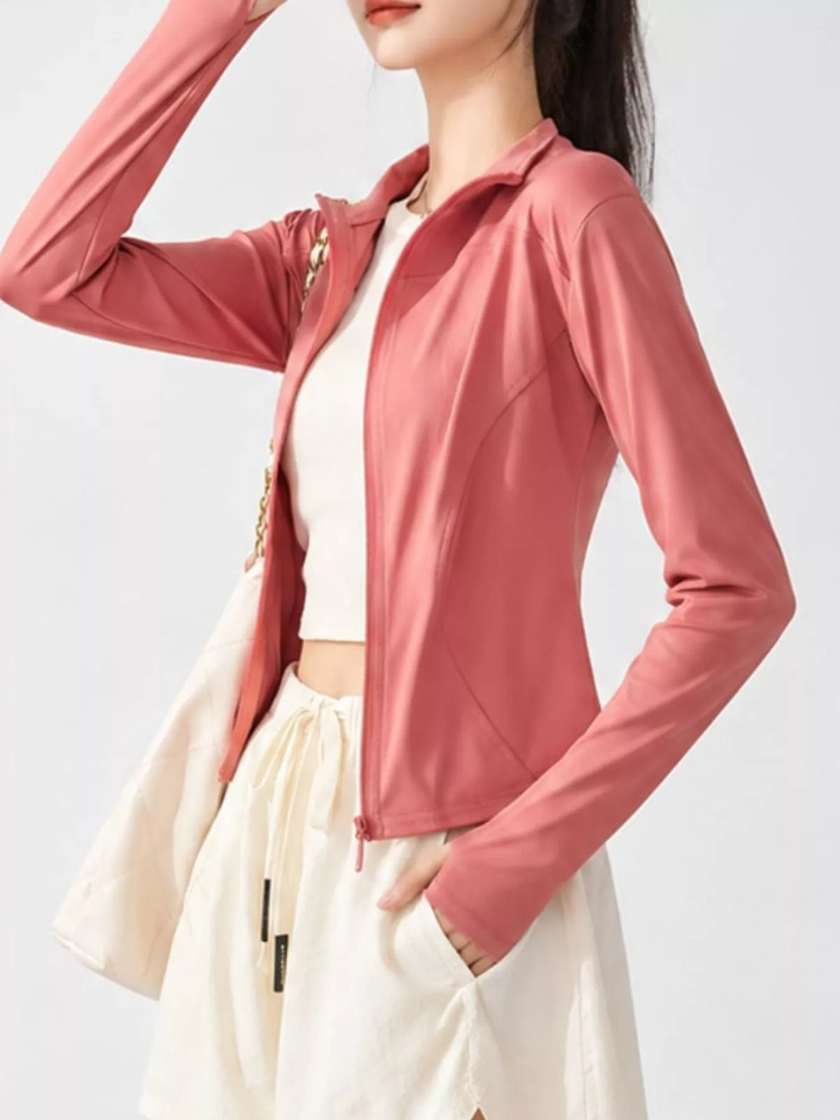 Pink quick-dry zip-up jacket, side view
