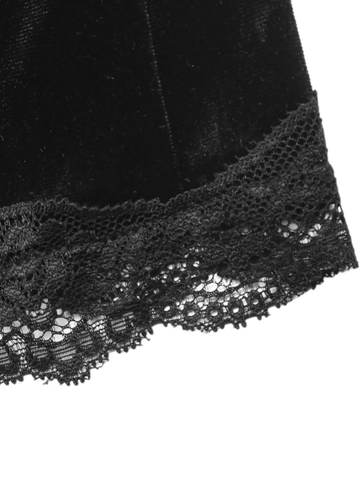 Black velvet mini skirt with lace trim, lace hem close-up