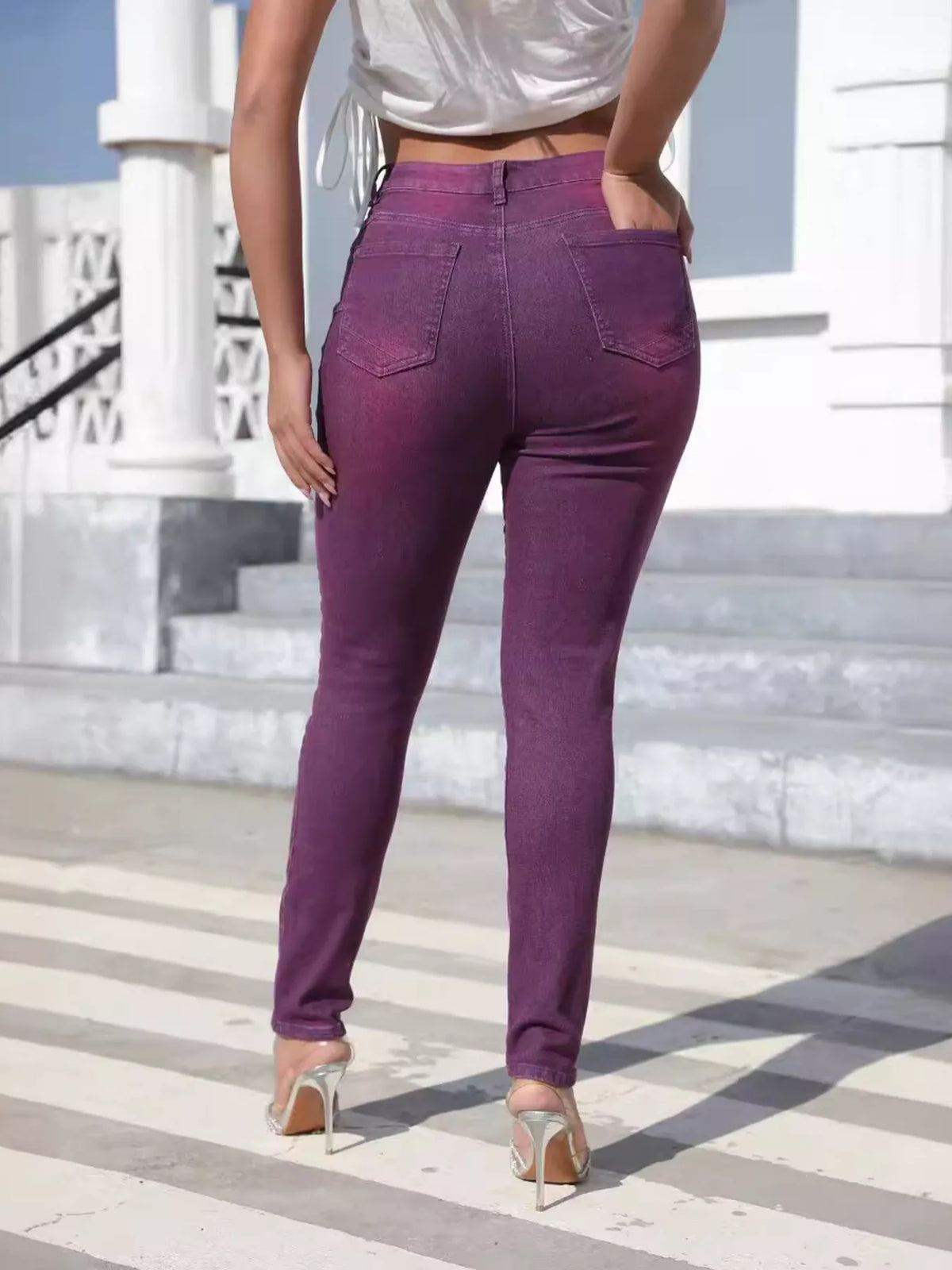 High-waisted slim-fit jeans