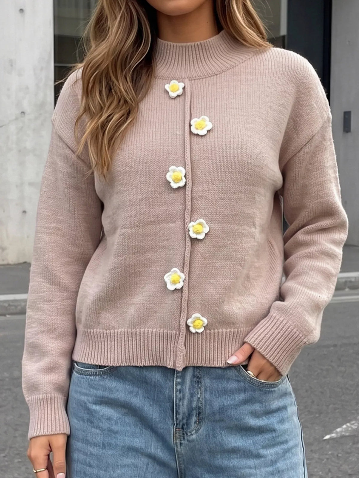 Taupe floral applique mock-neck sweater, front view.