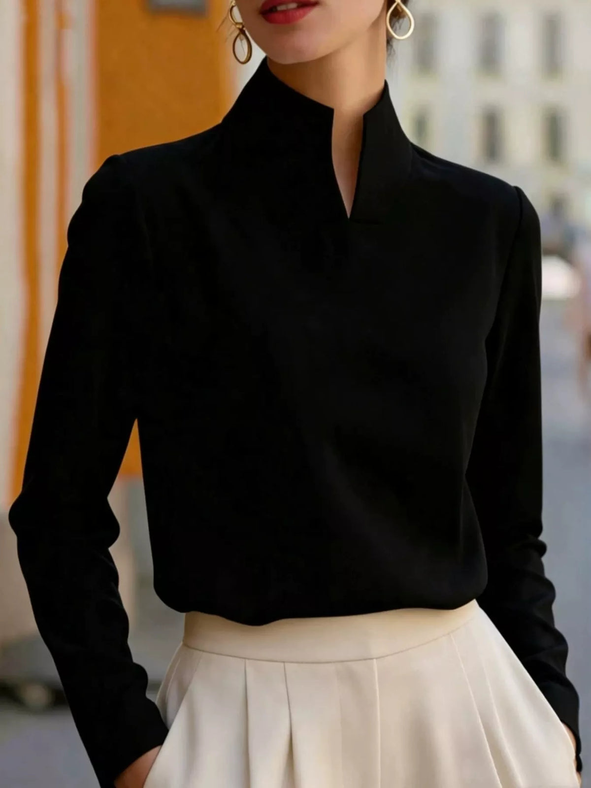 Mandarin neck long sleeve blouse, front view on model