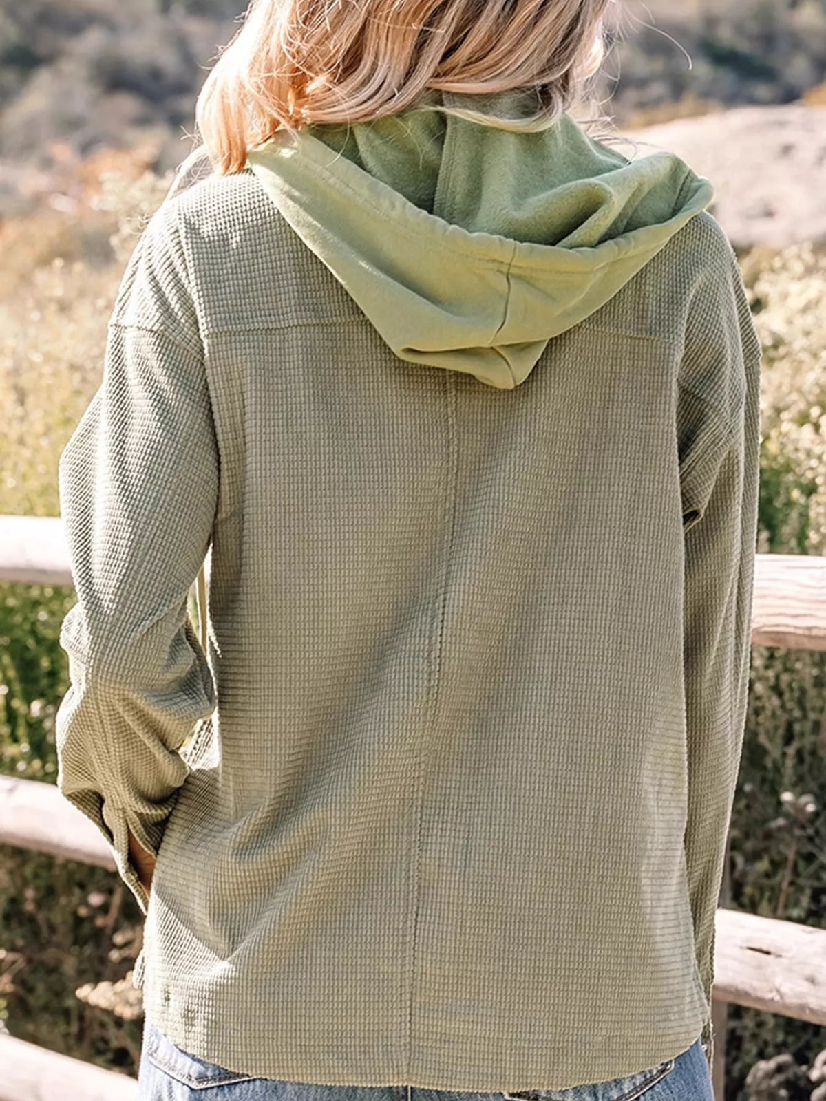 Olive textured long sleeve hooded jacket — back view
