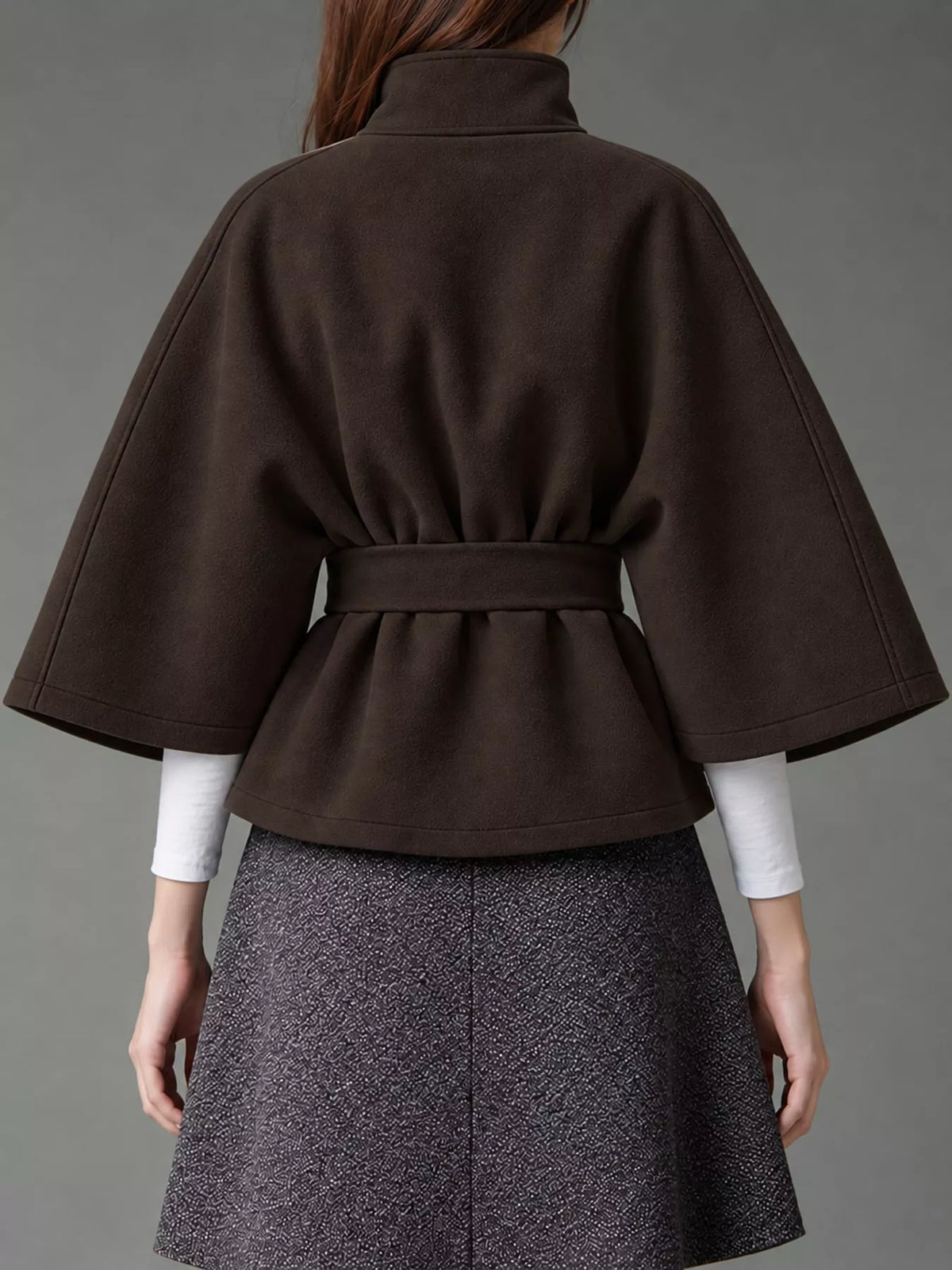Brown belted button-front cape — back view