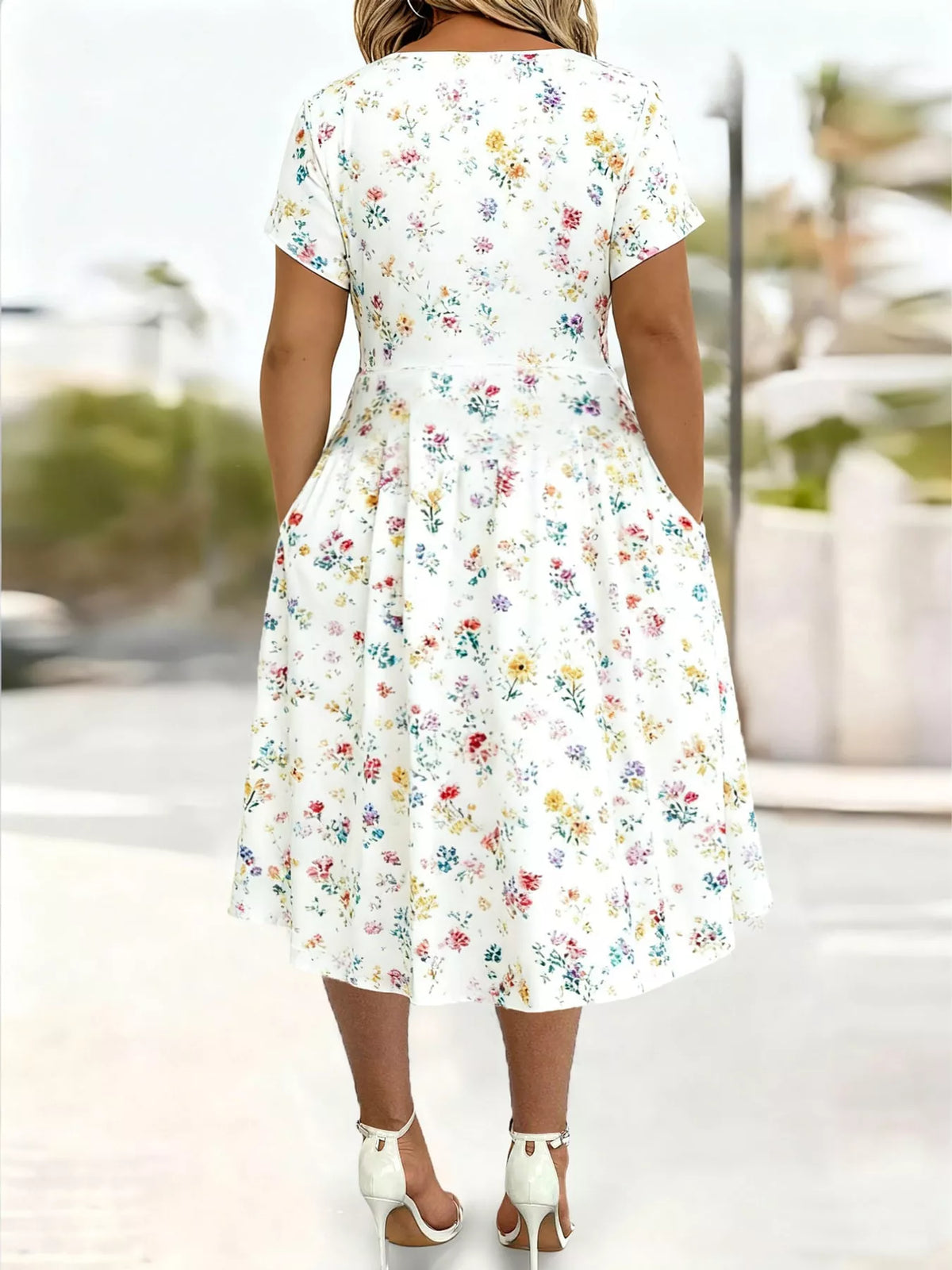 White floral short sleeve midi dress with pockets, back view