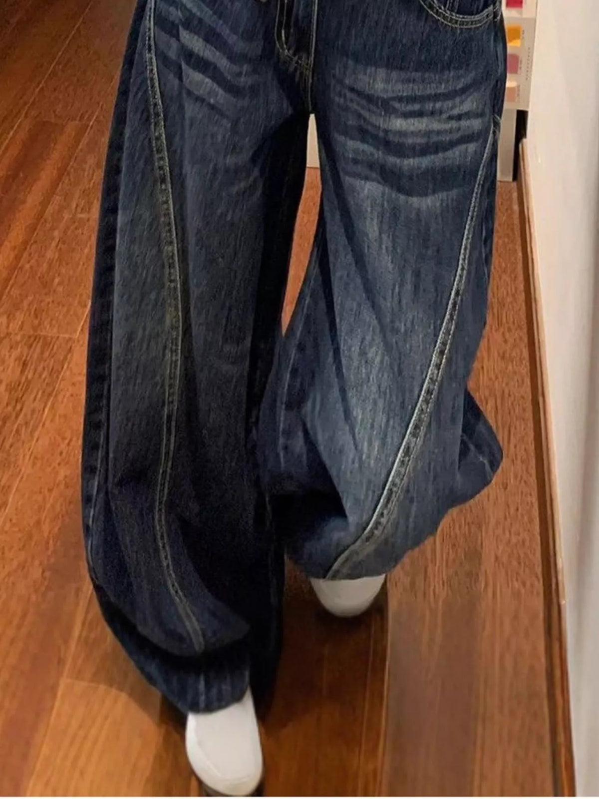 High-Waisted Wide-Leg Asymmetric Seam Vintage Wash Jeans — front view
