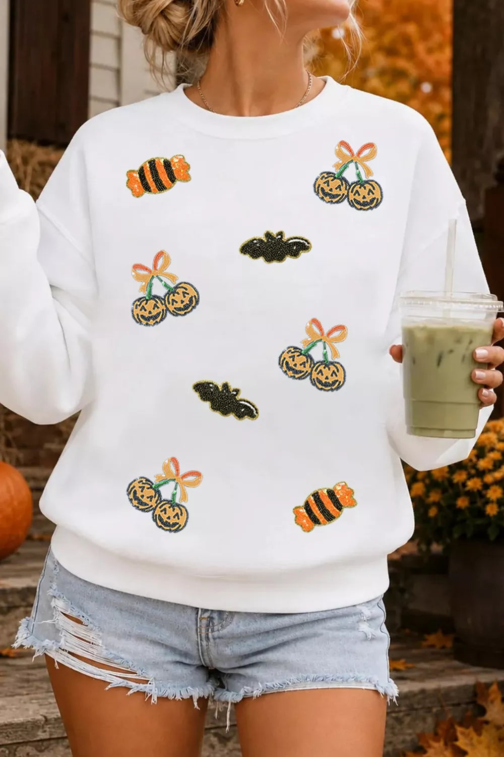 Sequin Halloween Pattern Pullover Sweatshirt in white, front view