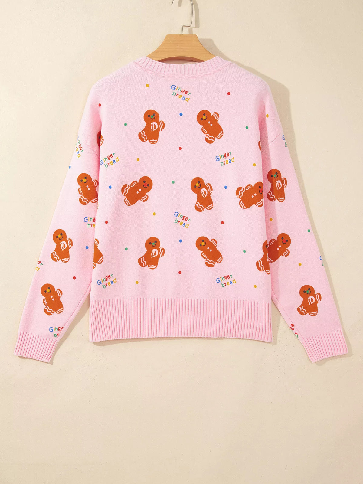 Gingerbread Pattern Long Sleeve Round Neck Sweater in pink, hanger back view